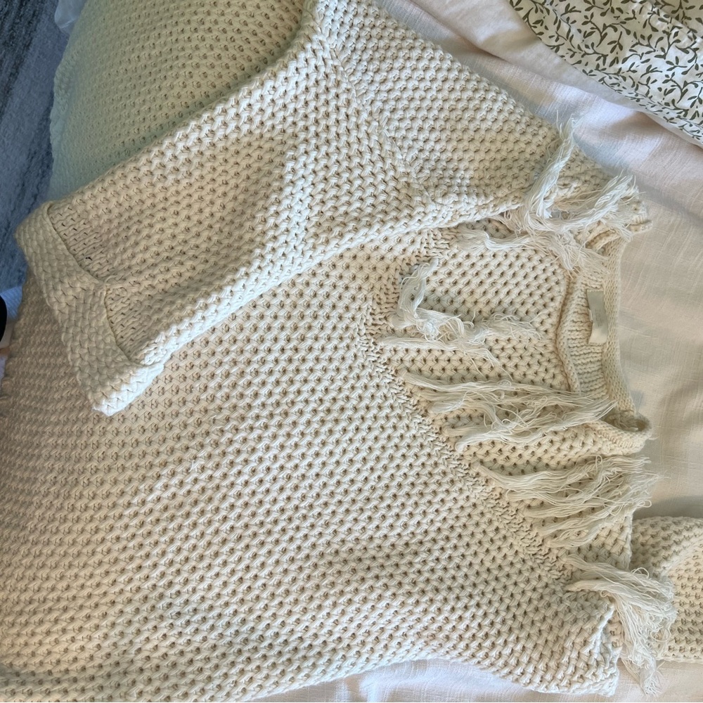 Cream textured sweater with fringe
